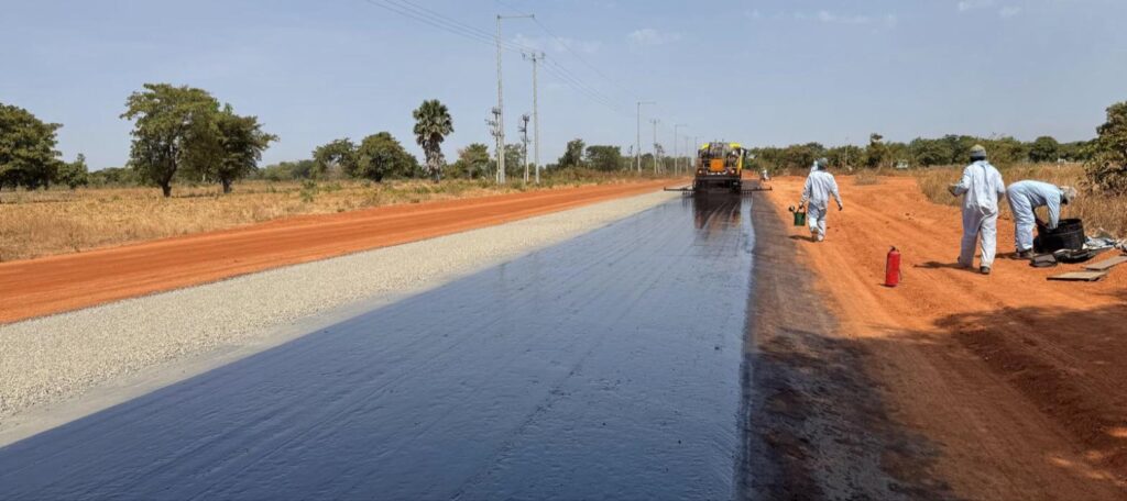 Freshly applied double bituminous surface treatment on the Kome 4 to Madjo road in Chad