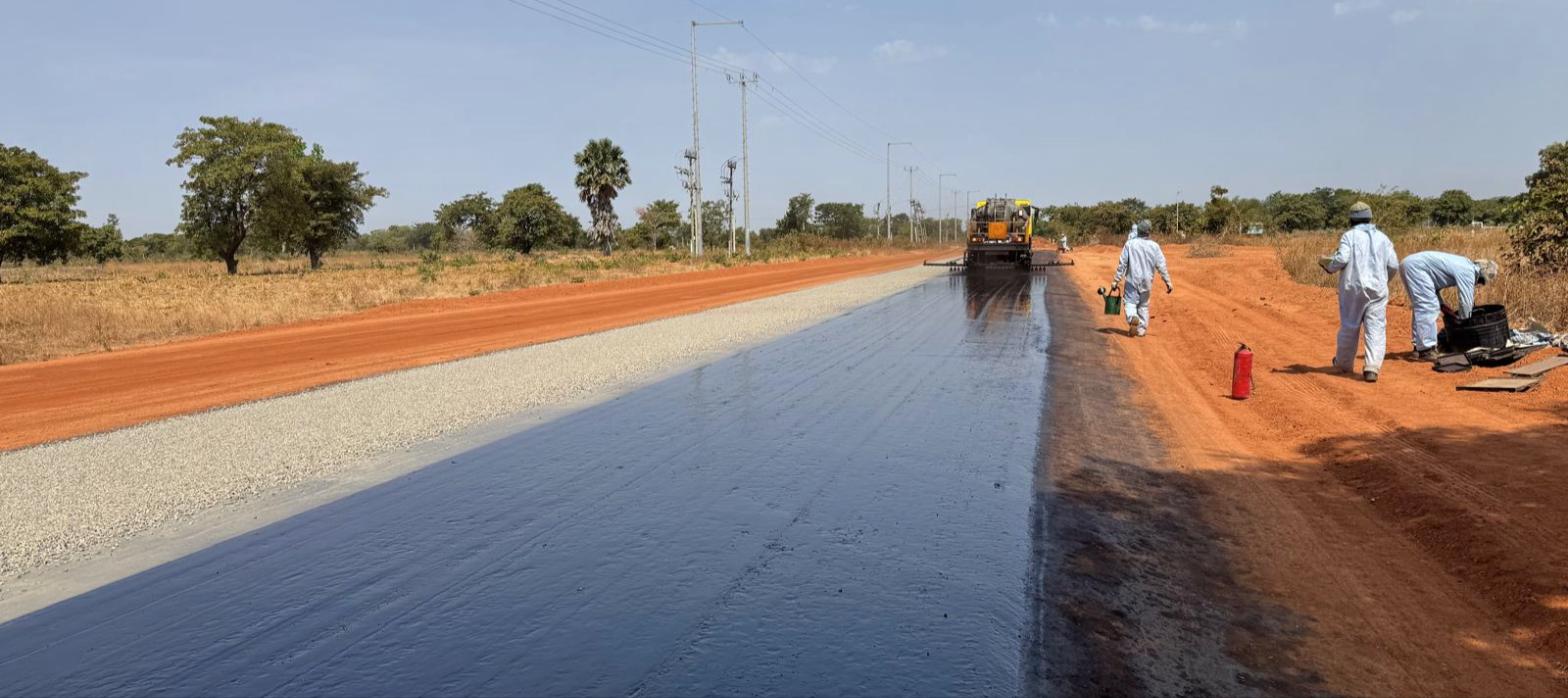 Freshly applied double bituminous surface treatment on the Kome 4 to Madjo road in Chad